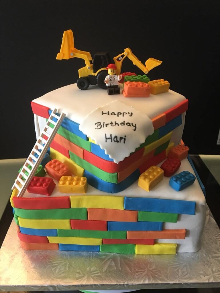 LEGO-brick construction cake with a digger topper